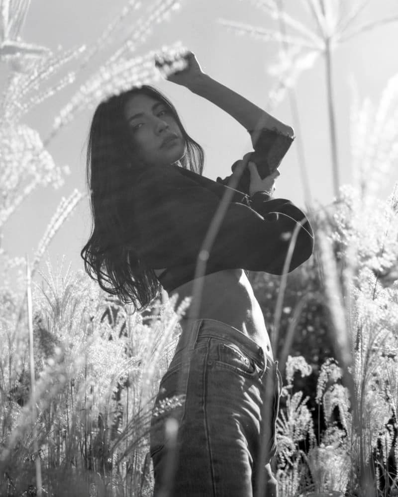 Woman in Tall Grass by Tyler McAuley — canvas wall art