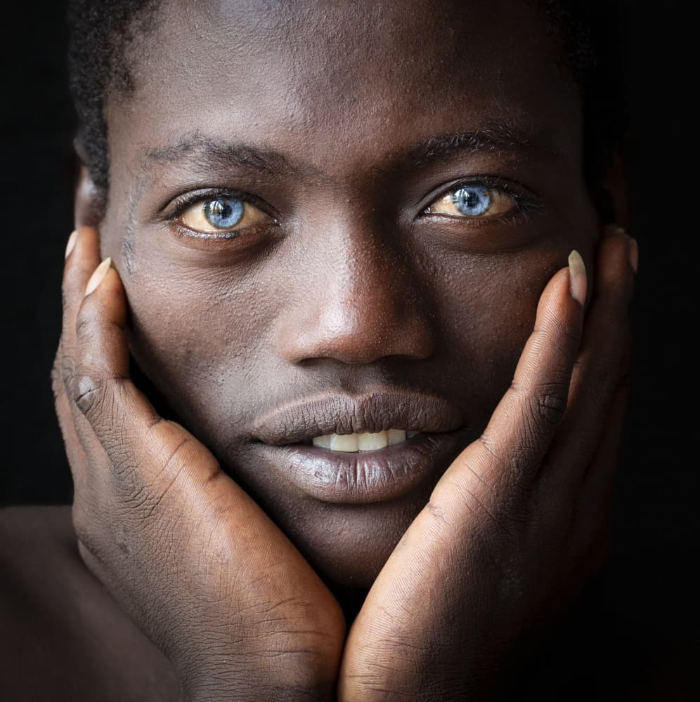 Dark Skin Blue Eyes by Hamza Qarooni — canvas wall art
