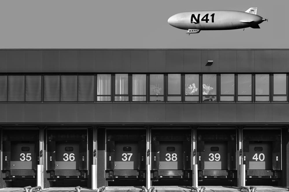 Airship Over Industrial Docks by Theo Luycx — canvas wall art