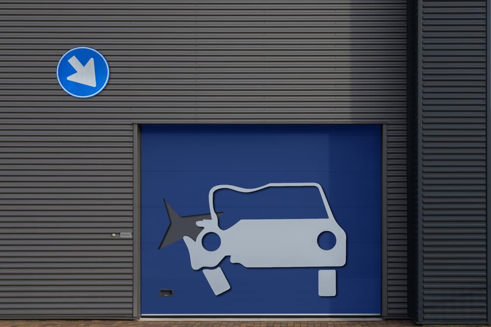 Damaged Car Garage Door by Theo Luycx — canvas wall art