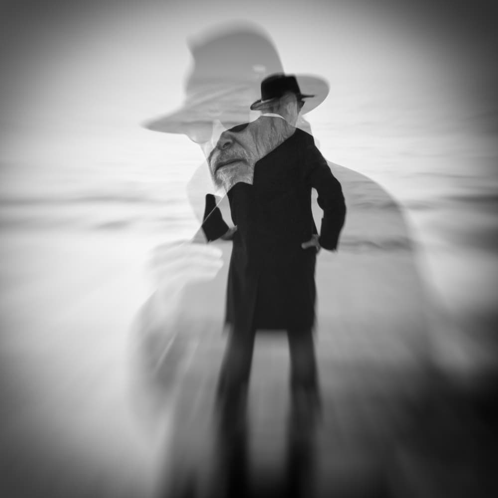 Mysterious Man In Hat by Roswitha Schleicher-Schwarz — canvas wall art