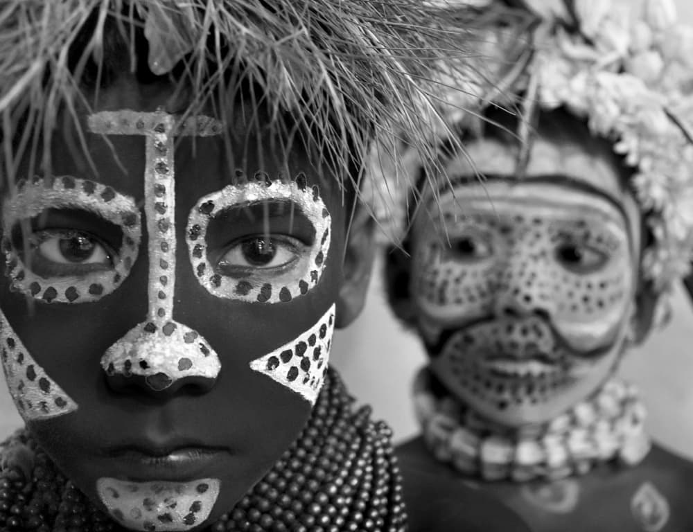 Painted Tribal Faces by Moumita Mondal — canvas wall art