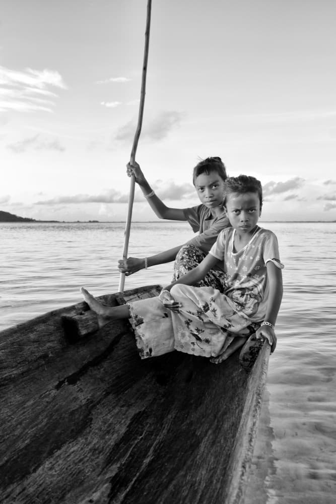 Two Girls In Boat by Kieron Long — canvas wall art