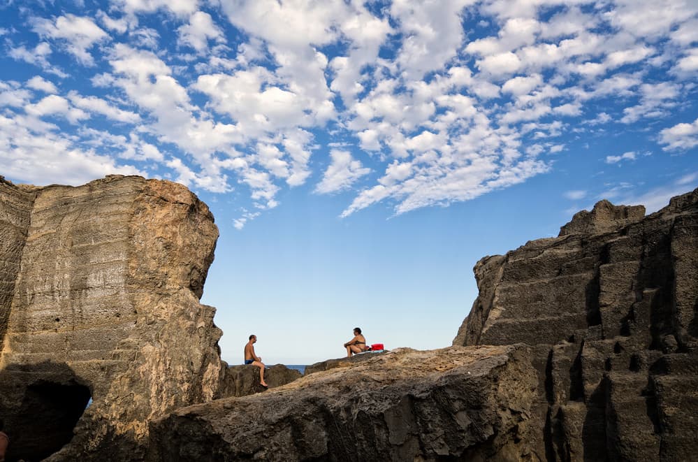 Men on Coastal Cliffs by Lorenzo Grifantini — canvas wall art