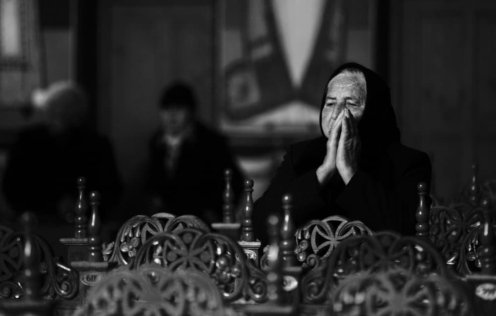 Elderly Woman Praying by Julien Oncete — canvas wall art