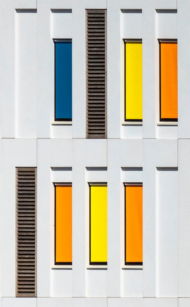 Vibrant Building Facade by Jef Van den Houte — canvas wall art