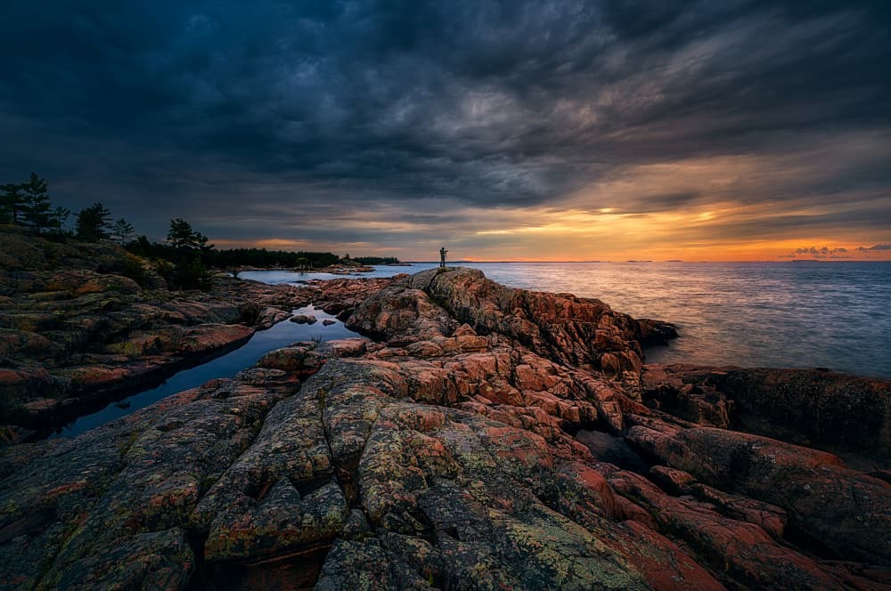 Dramatic Rocky Coast Sunset by Ben.C.L — canvas wall art