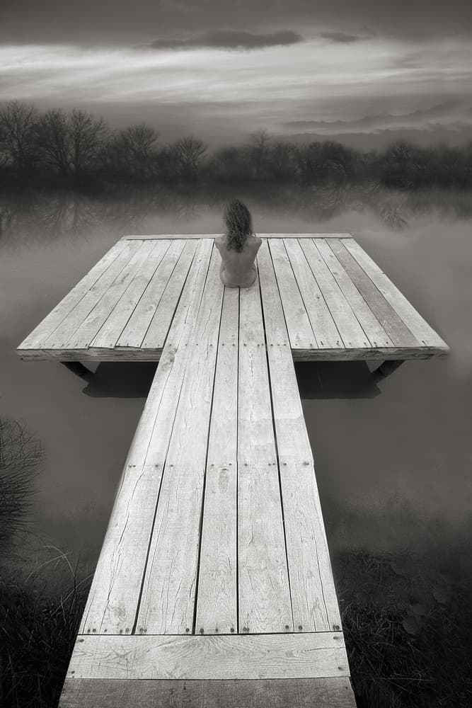 Woman On Misty Dock by Jan Donckers — canvas wall art