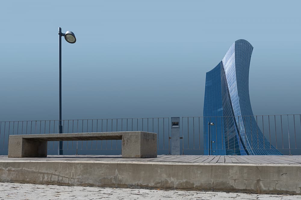 Sleek Building and Bench by Roland Weber — canvas wall art