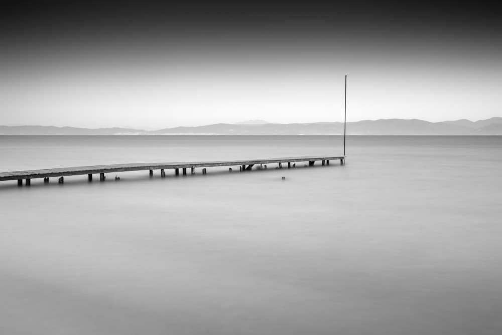 Minimal Black White Pier by Catalin Baican — canvas wall art
