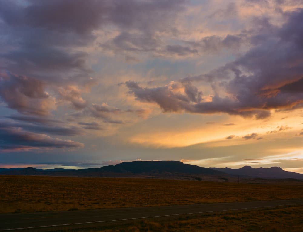 Golden Sunset Over Mountains by Bethany Young — canvas wall art