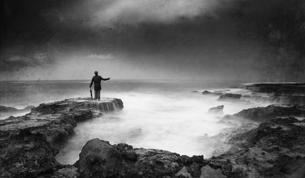 Lone Man Stormy Coast by Hari Sulistiawan — canvas wall art