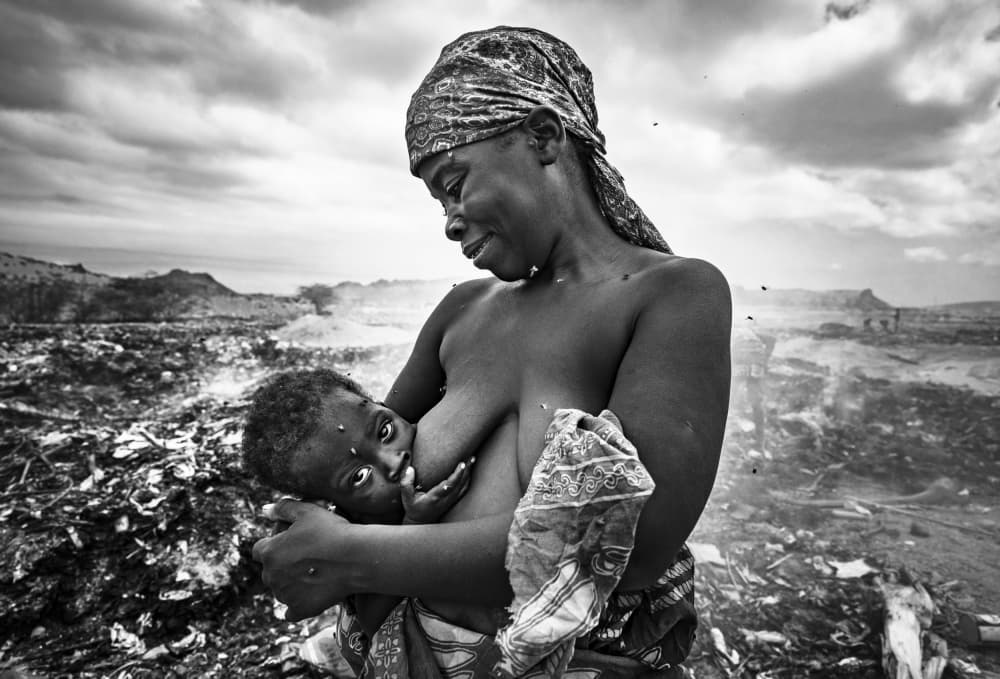 African Mother Breastfeeding by João Coelho — canvas wall art