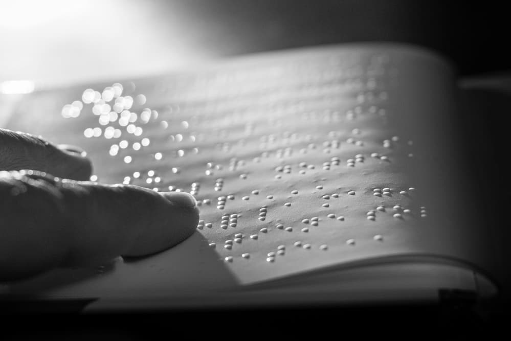 Hand Reading Braille by Giorgio Toniolo — canvas wall art