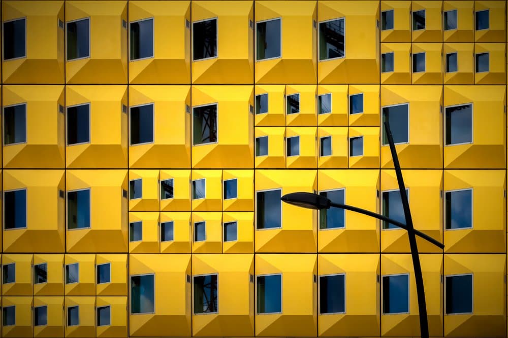 Geometric Yellow Facade by Anita Martin AnnaPileaFotografie — canvas wall art