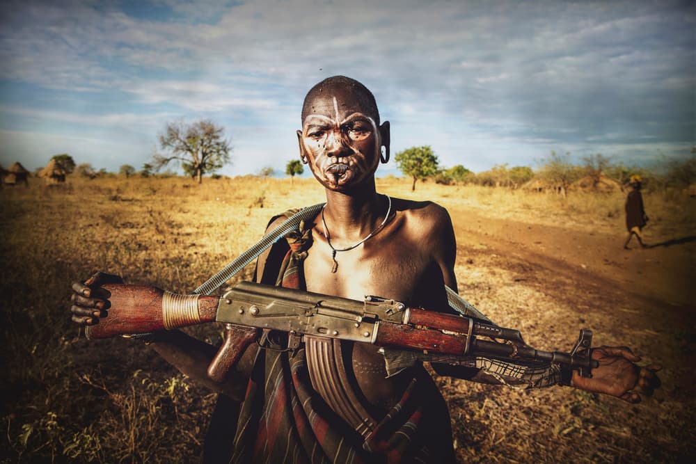 Tribal Man With Rifle by Svetlin Yosifov — canvas wall art