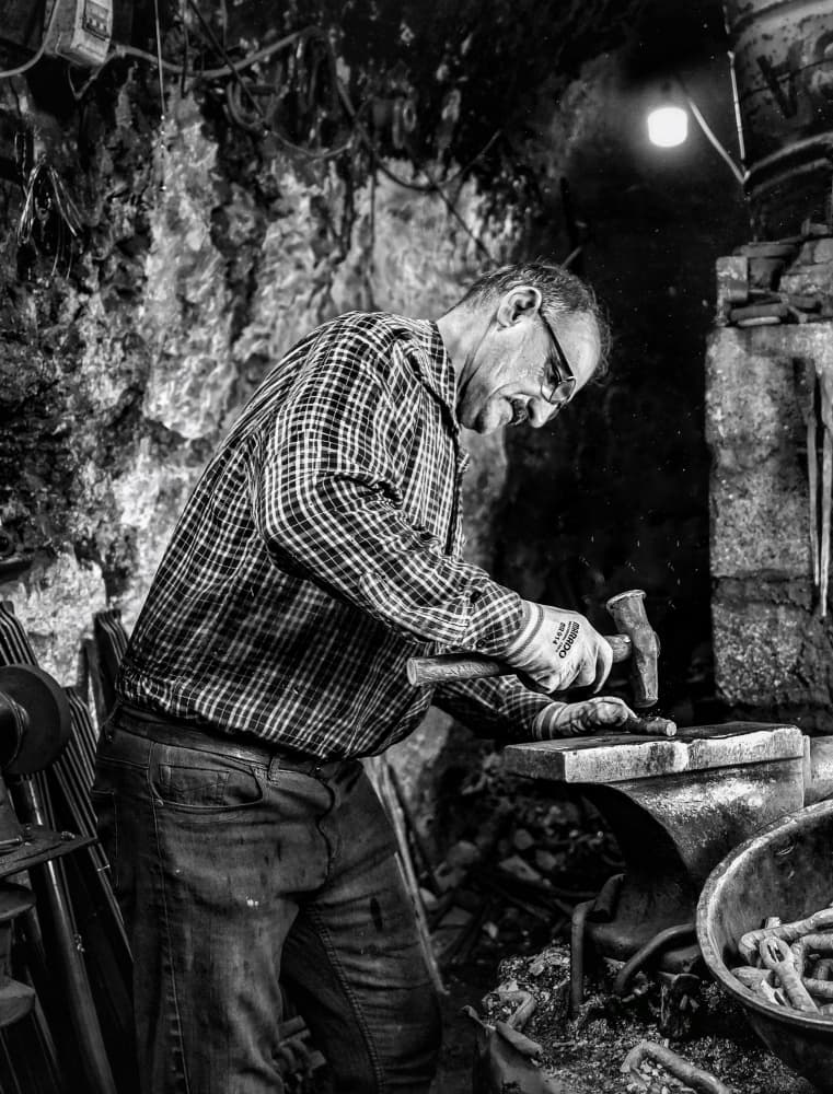 Blacksmith at Work by Bashar Alsofey — canvas wall art