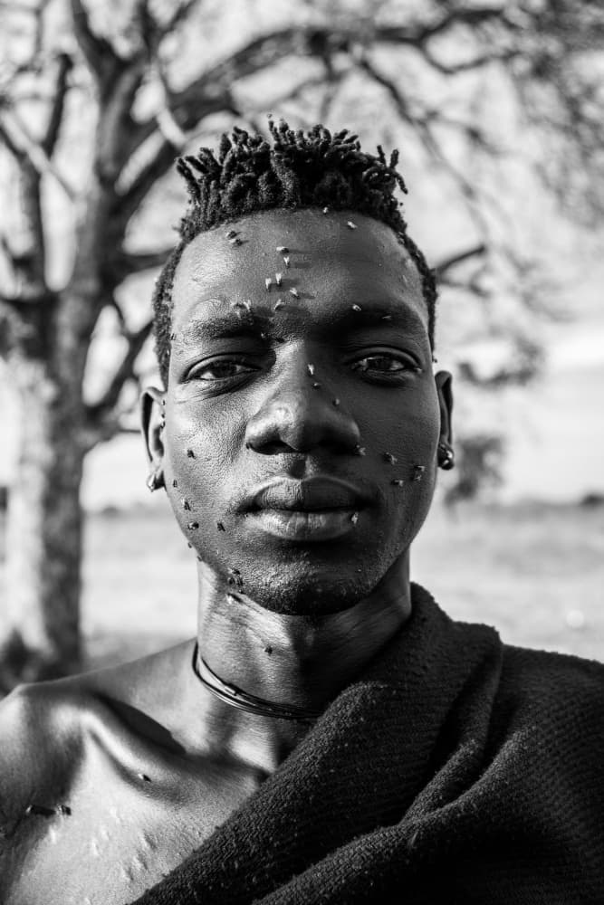 African Man With Flies by Svetlin Yosifov — canvas wall art