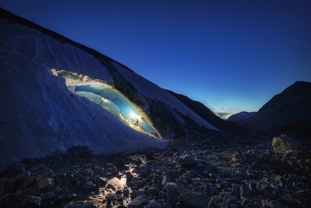 Glowing Ice Cave Night by Clara Gamito — canvas wall art
