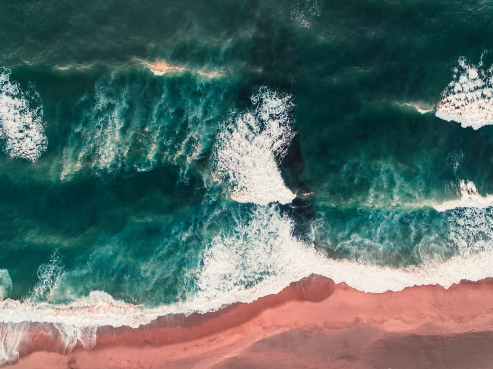 Pink Sand Ocean Waves by Javier Pardina — canvas wall art