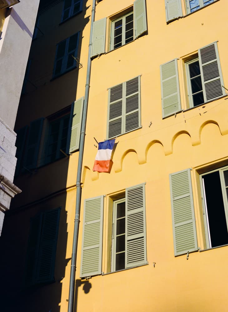 Sunny Yellow French Building by Bethany Young — canvas wall art