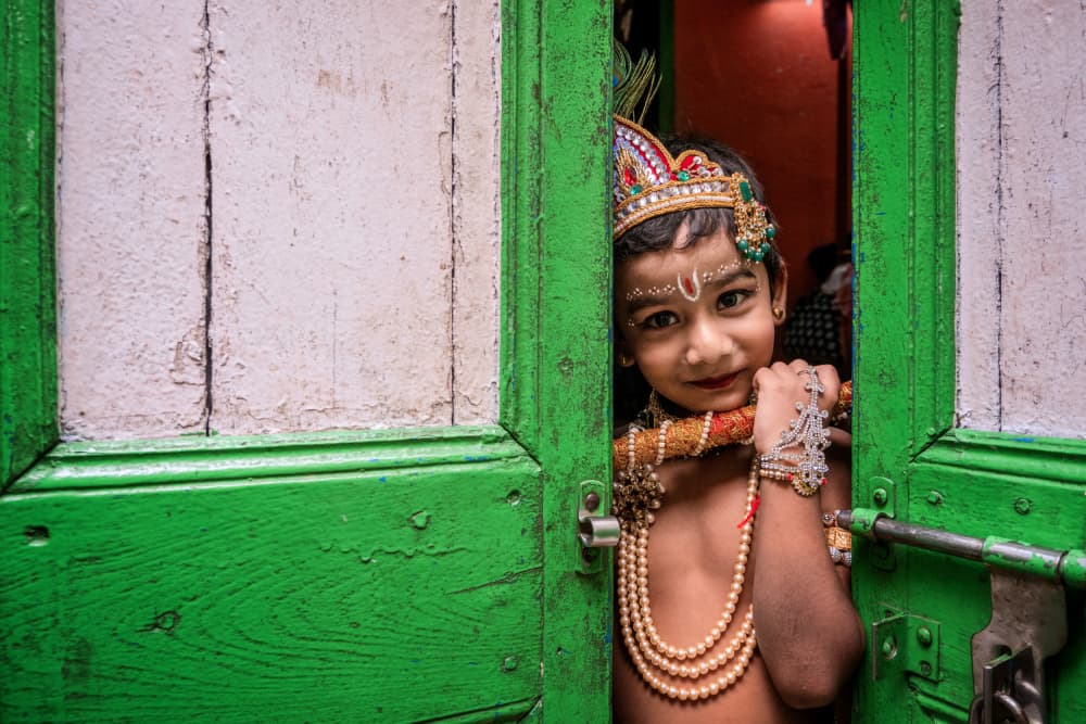 Krishna Child with Flute by Kuntal Biswas — canvas wall art