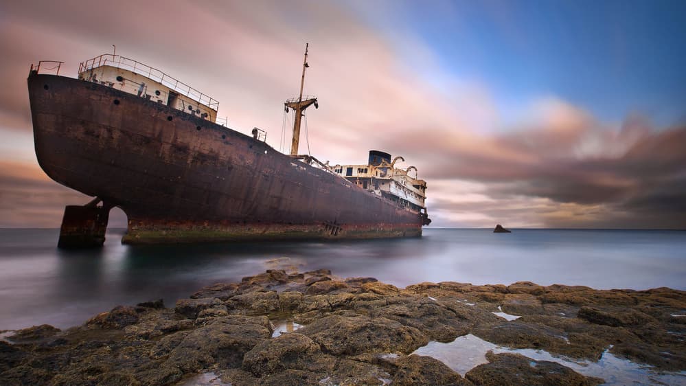 Rusty Shipwreck Coast by Adam Pachula — canvas wall art