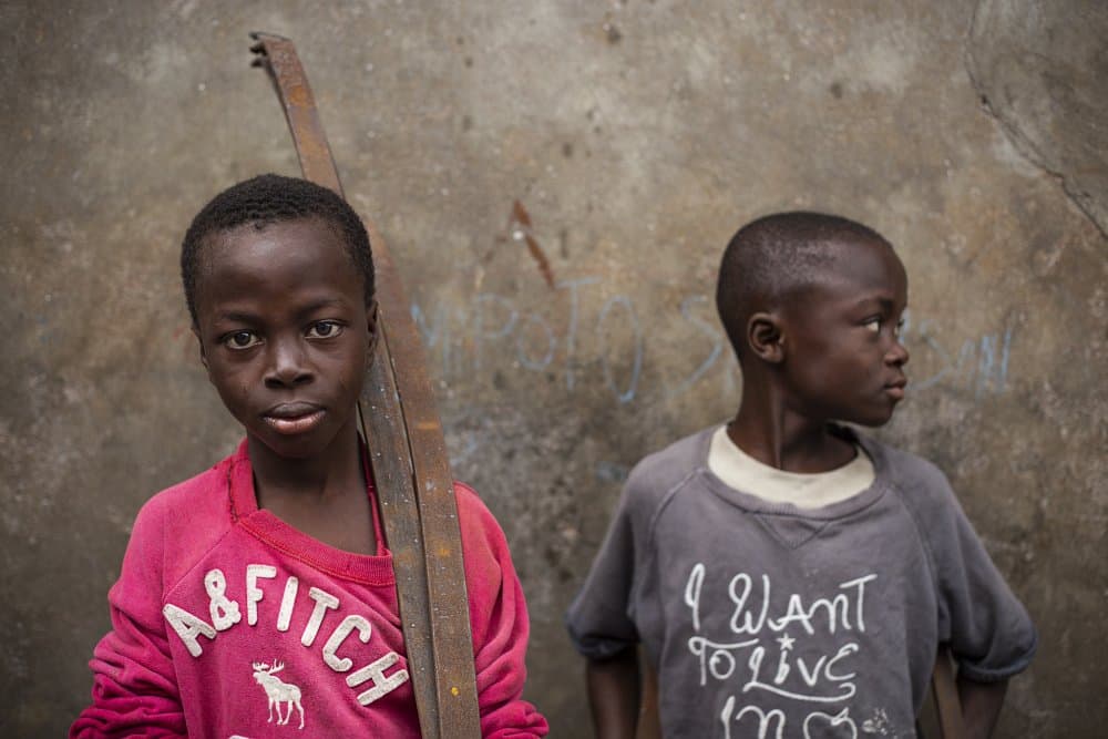 Thoughtful Young Faces by Emel Sefer — canvas wall art