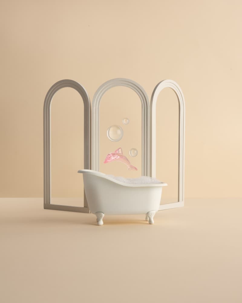 Pink Dolphin Dream Bath by Julia Ramiro — canvas wall art