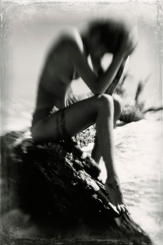 Lonely Woman on Shore by Bogdan Bouşcă — canvas wall art