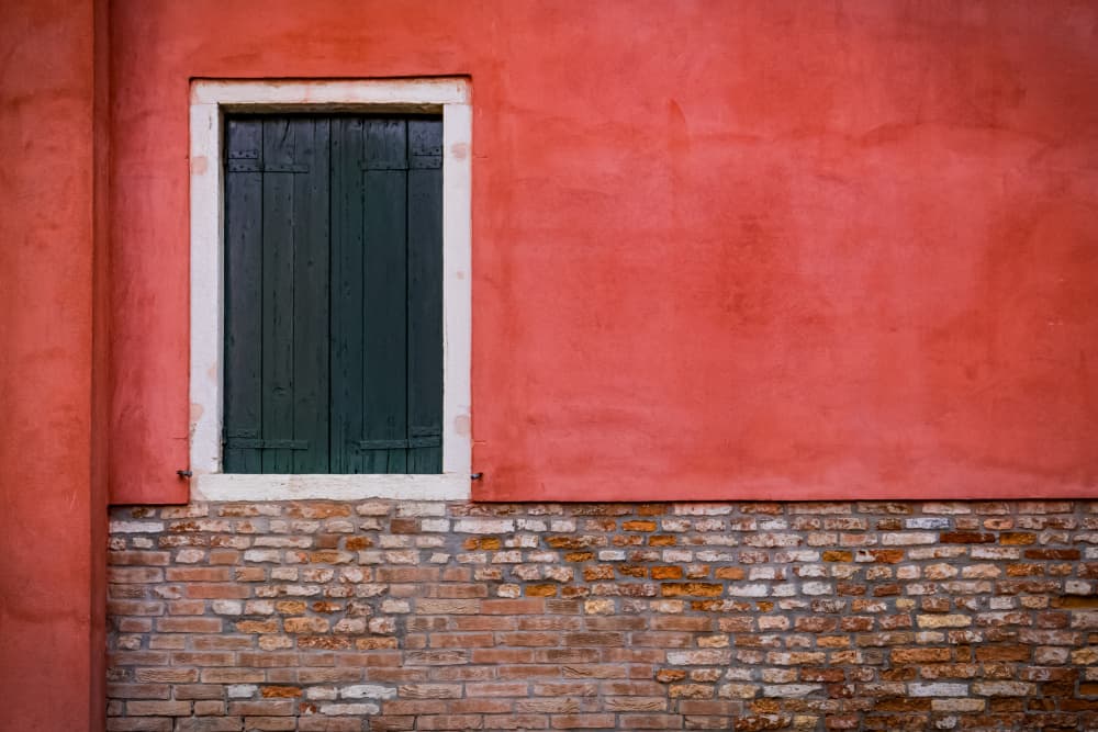 Green Shutters Red Wall by Heike Wolters-Wrase — canvas wall art