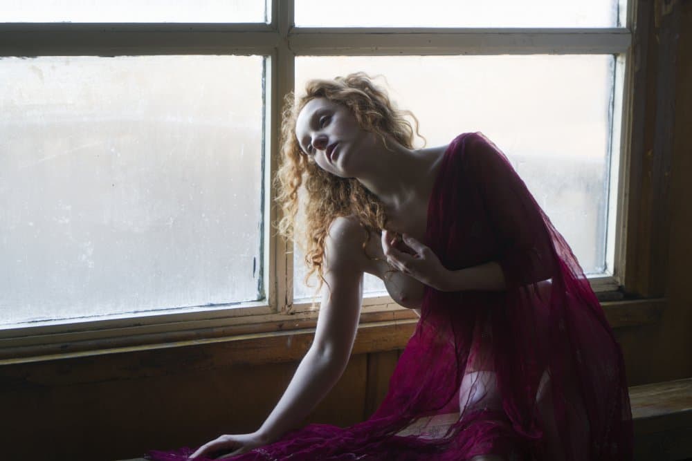 Pensive Woman By Window by Mel Brackstone — canvas wall art