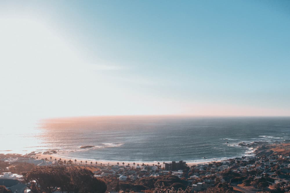Coastal Horizon Glow by Kauthar Isaacs — canvas wall art