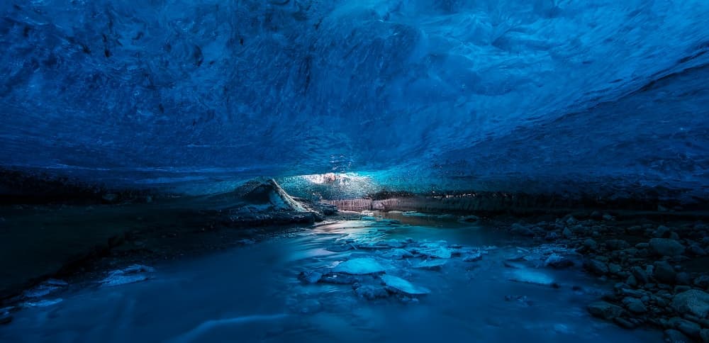 Ethereal Ice Cave River by David Martin Castan — canvas wall art
