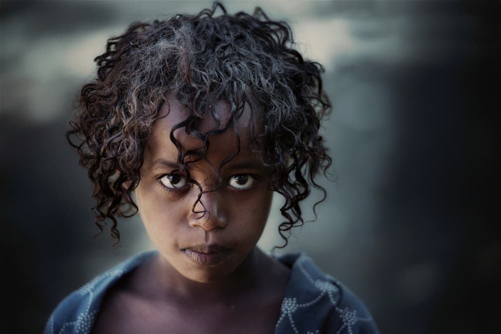 Child's Intense Gaze by Trevor Cole — canvas wall art
