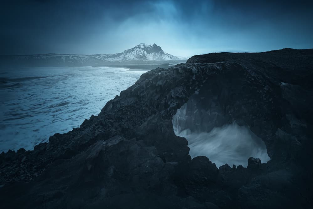 Moody Ocean Arch Waves by David Martin Castan — canvas wall art