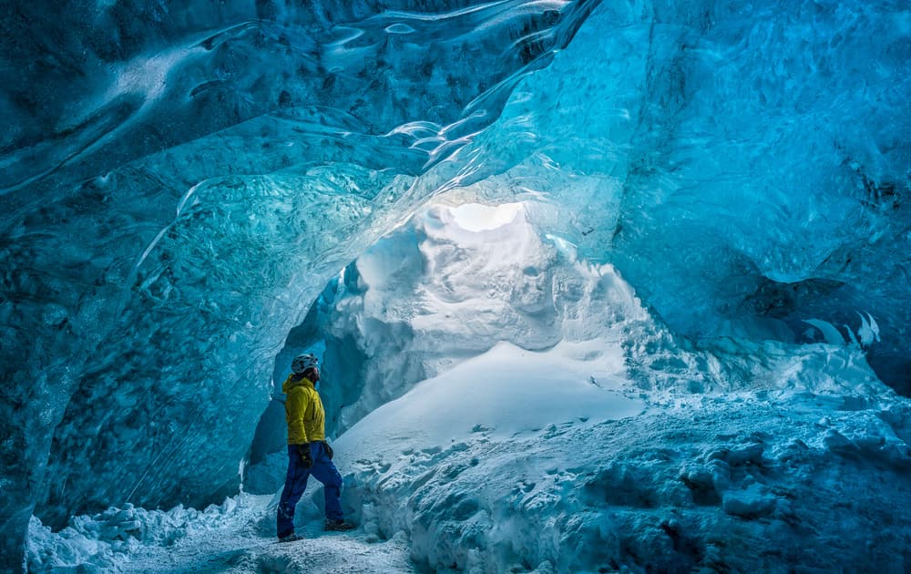 Blue Ice Cave Adventure by Marc Pelissier — canvas wall art