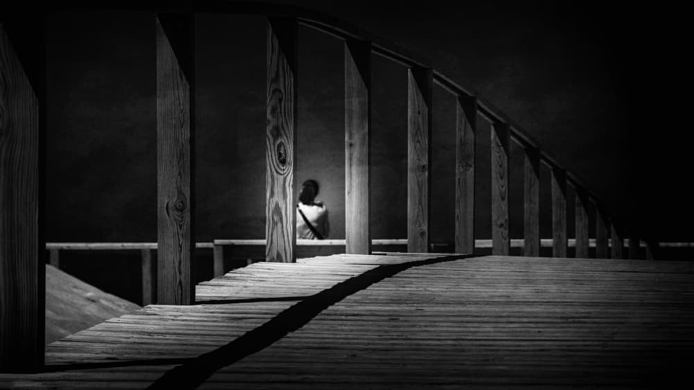 Lone Figure on Bridge by Laura Mexia — canvas wall art