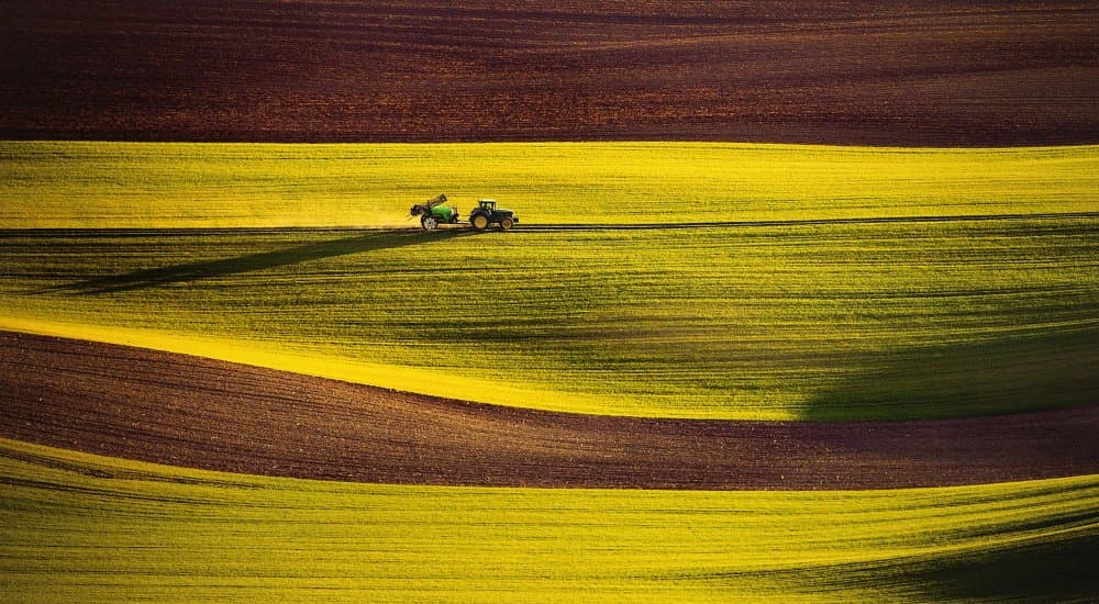 Tractors In Patterned Fields by Milan Uhrin AFIAP AZSF — canvas wall art