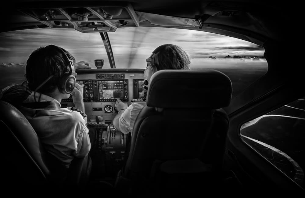 Pilots Flying Above Clouds by Rooswandy Juniawan — canvas wall art