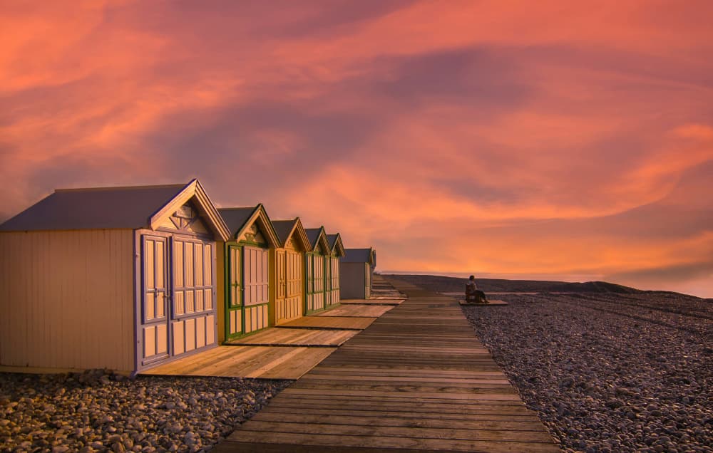 Colorful Beach Huts Sunset by Stéphane Pecqueux — canvas wall art