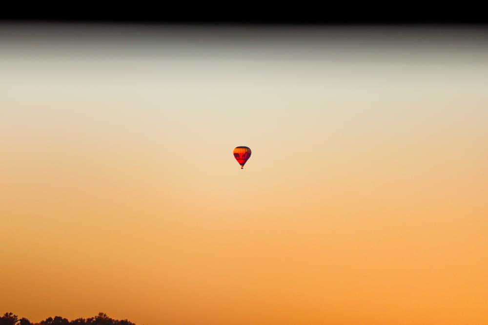 Golden Sky Balloon by Patrick Muthui — canvas wall art