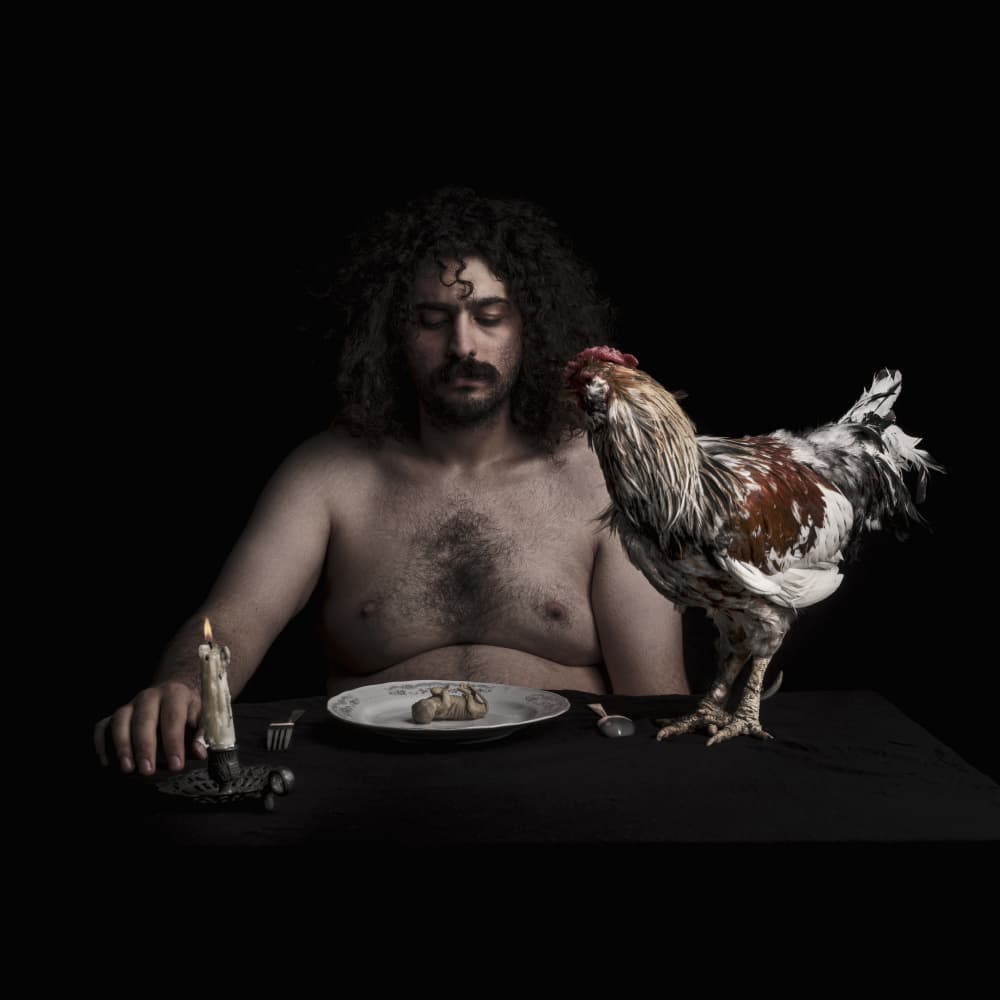 Man and Rooster Dinner by Hooman Sedaghi — canvas wall art