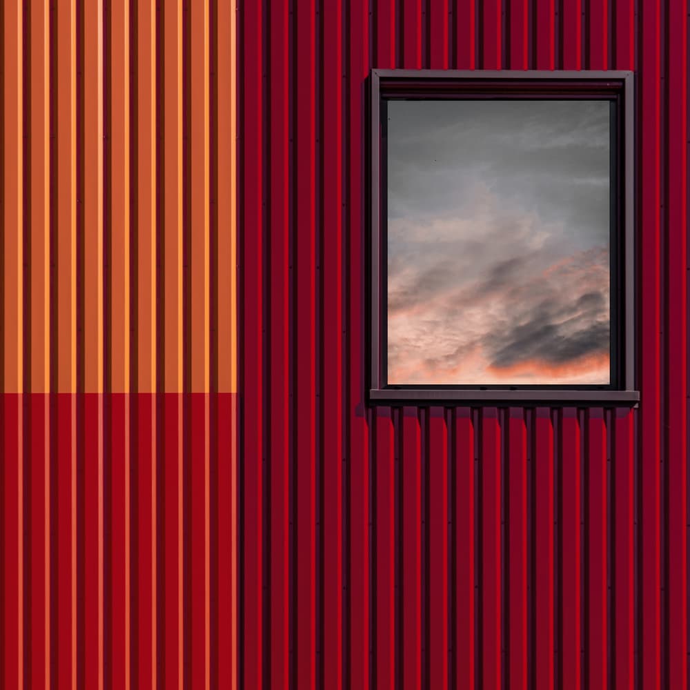 Red Wall Sky Reflection by Luc Vangindertael (laGrange) — canvas wall art