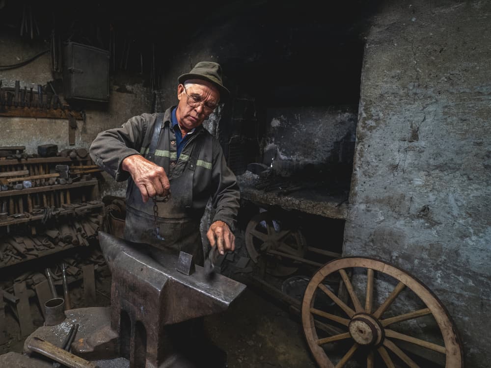 Old Blacksmith At Work by Zoran Toldi (EFIAP AZSF) — canvas wall art