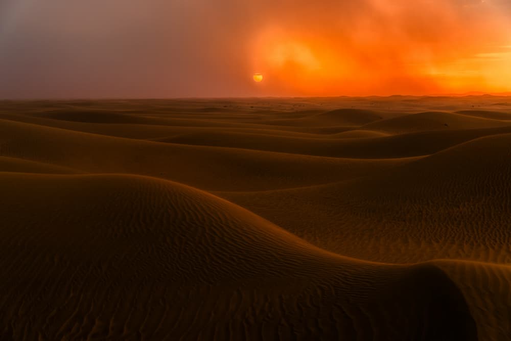 Sunset Over Sand Dunes by Yezimao — canvas wall art