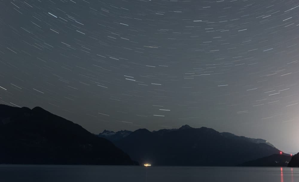 Star Trails Over Mountains by Lynann Colligan — canvas wall art