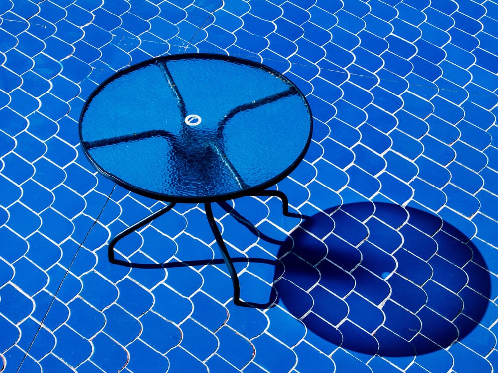 Blue Tile Table Shadow by Rolf Endermann — canvas wall art