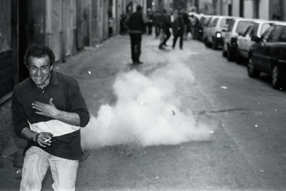 Distressed Man Street Smoke by Raffaele Maglione — canvas wall art