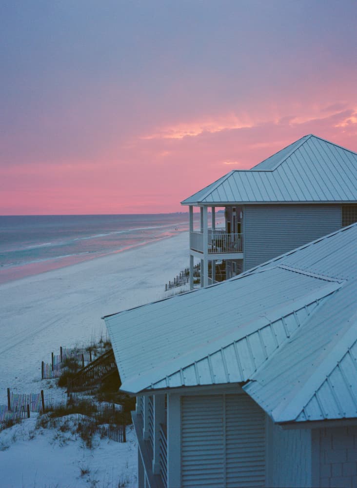 Pink Sunset Beach Houses by Bethany Young — canvas wall art
